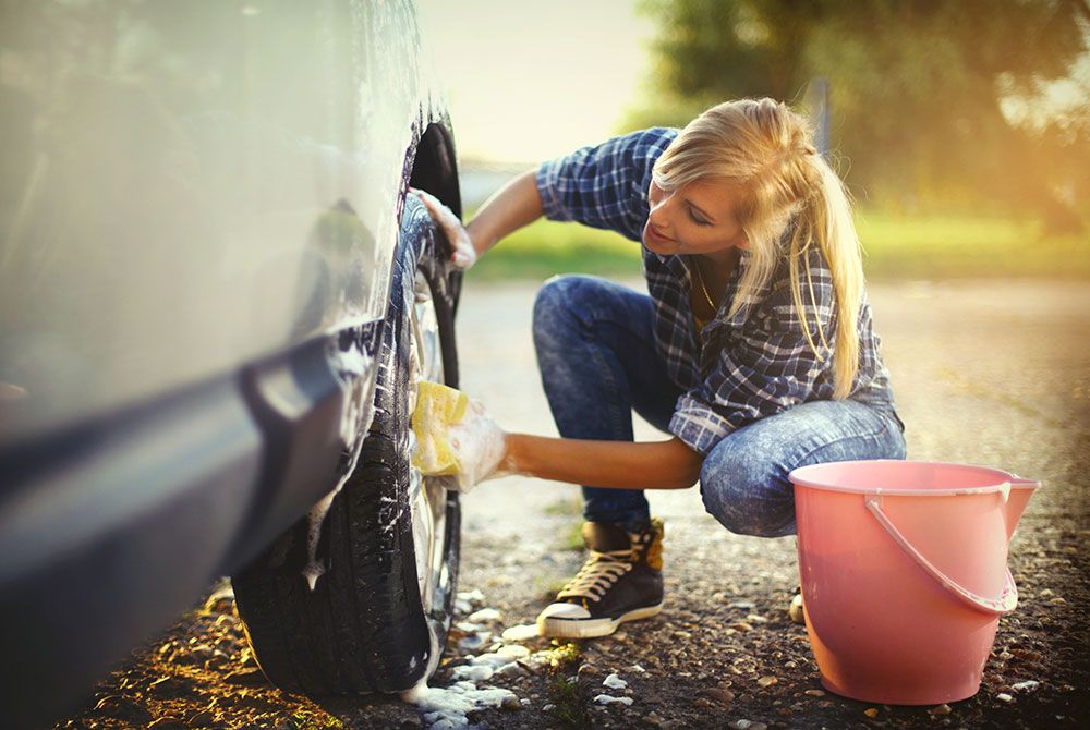 woman washing car