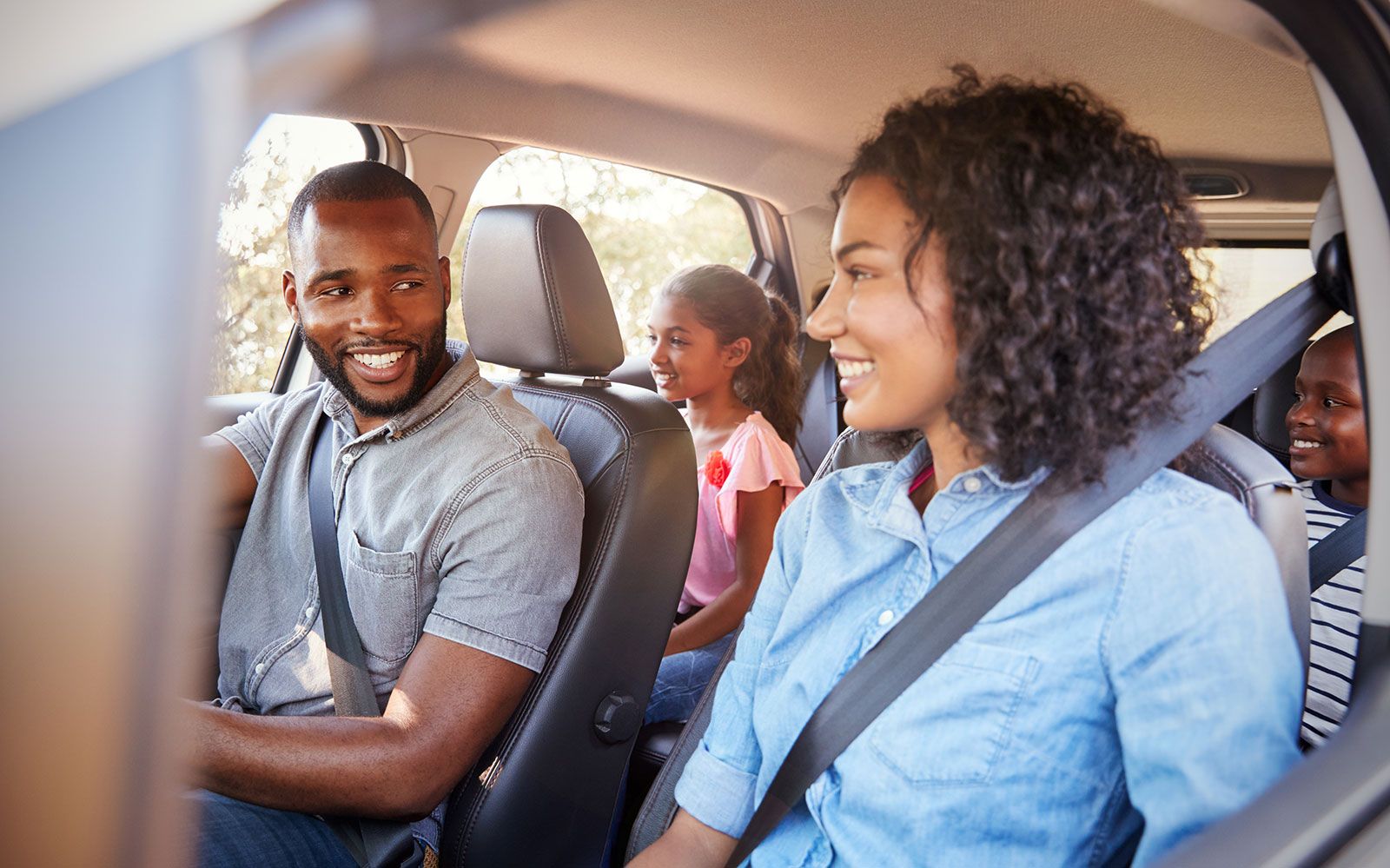 family driving in car