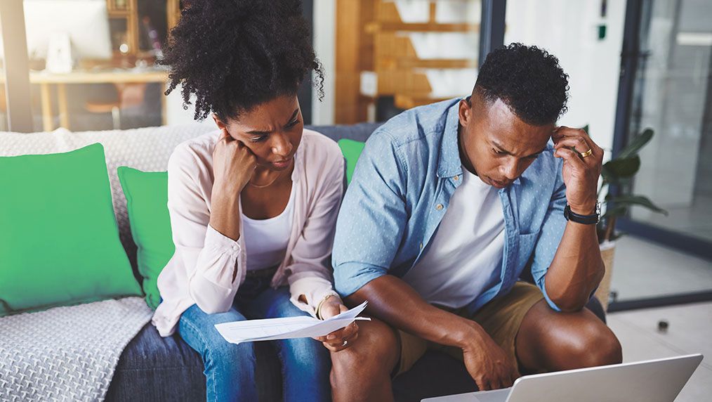 concerned couple in debt