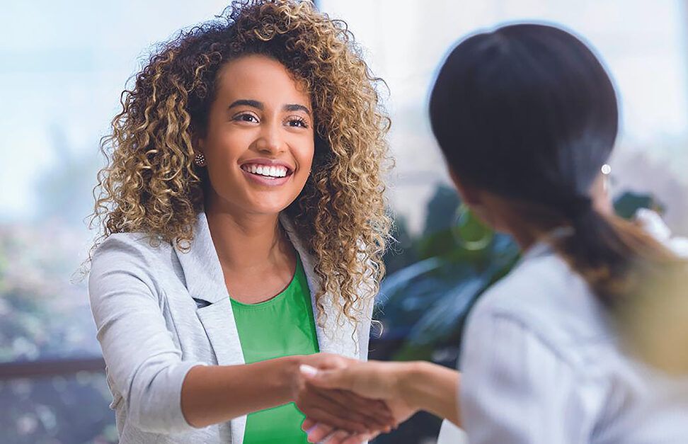 Women Shaking Hands